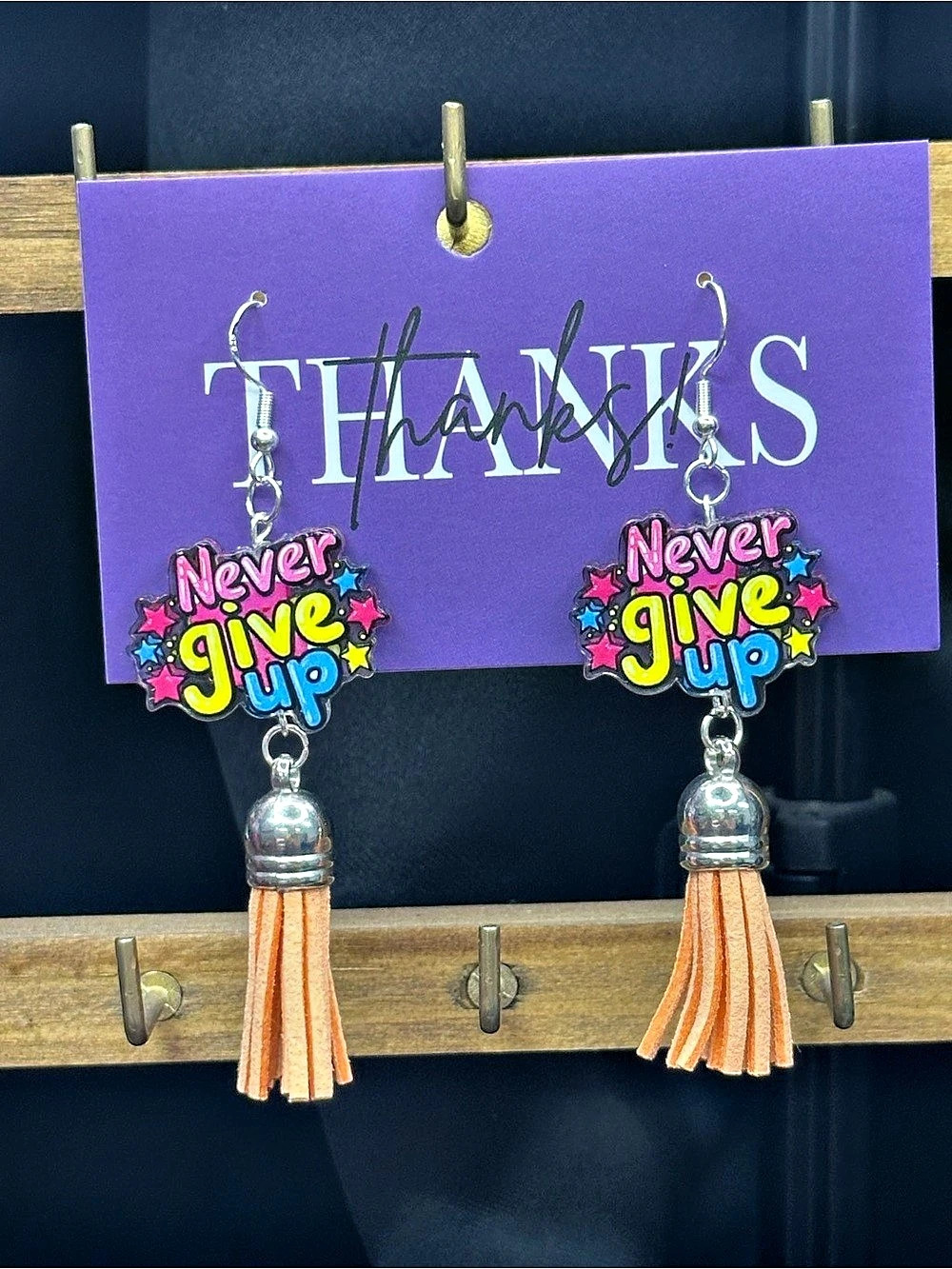 handmade "never give up" tassel earrings 🧡